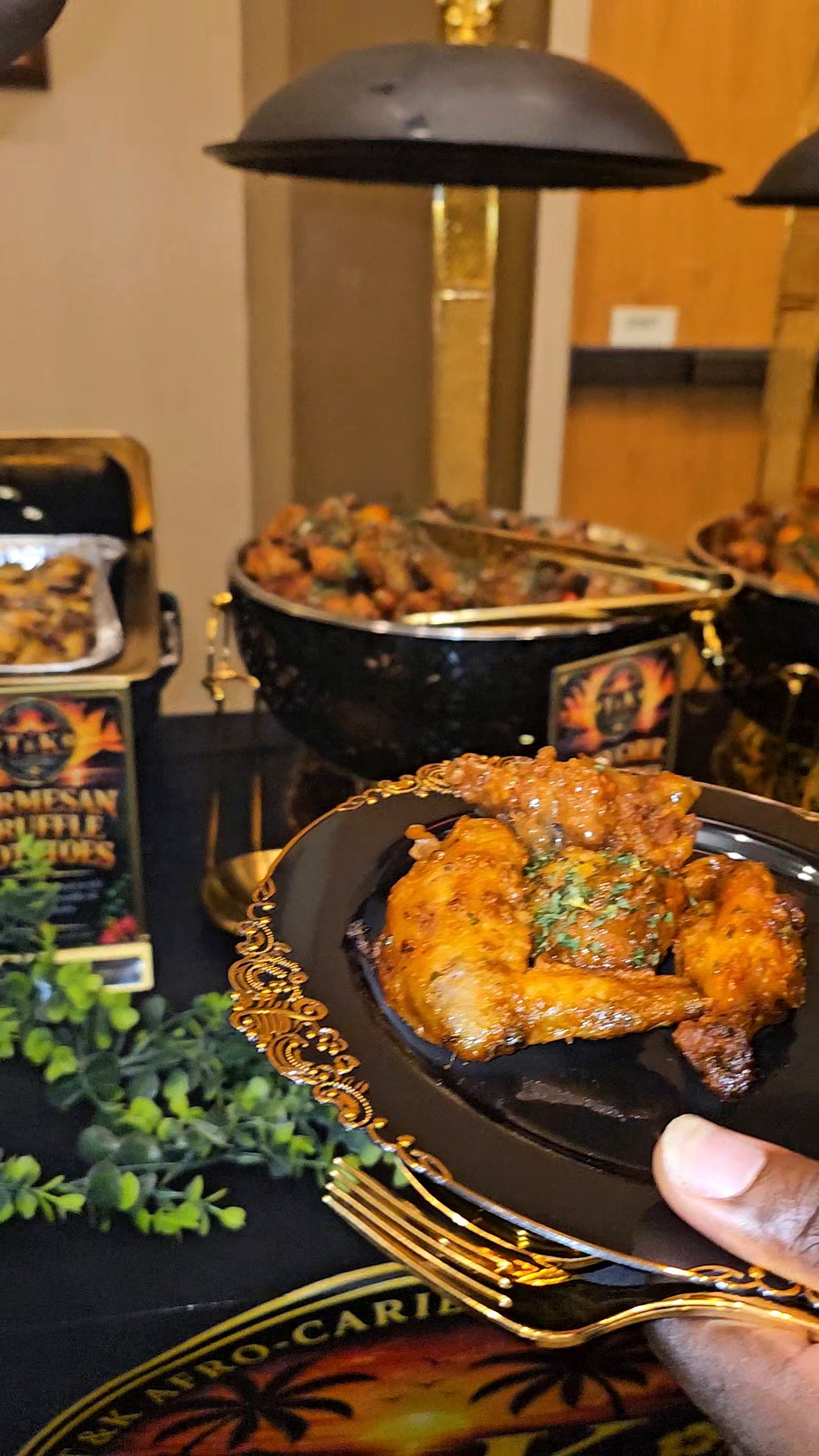 Parmesan truffle wings plated with gold cutlery at a catered event